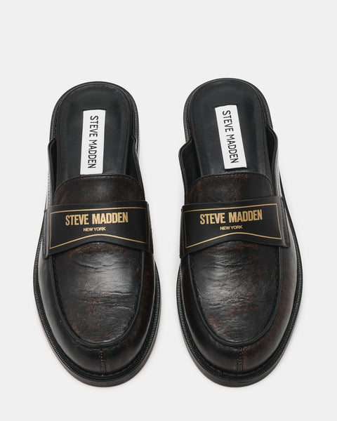 סטיב מאד - כפכפי מיולז מעור לנשים MOXXIE בשחור