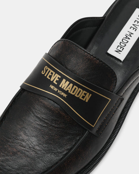 סטיב מאד - כפכפי מיולז מעור לנשים MOXXIE בשחור